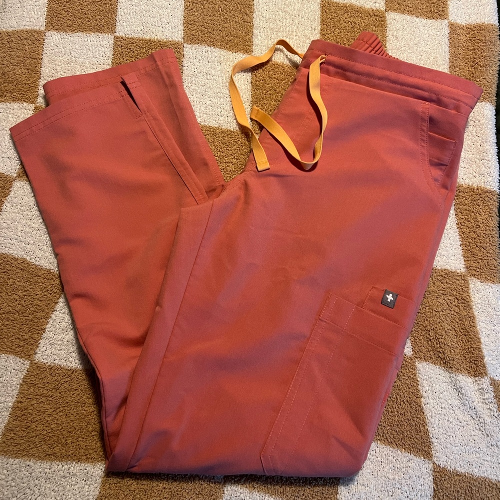FIGS Women's Scrub Pants in Brick Red with Yellow Drawstring